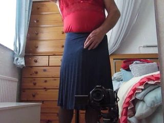 Wanking in pleated skirt and nylon slip