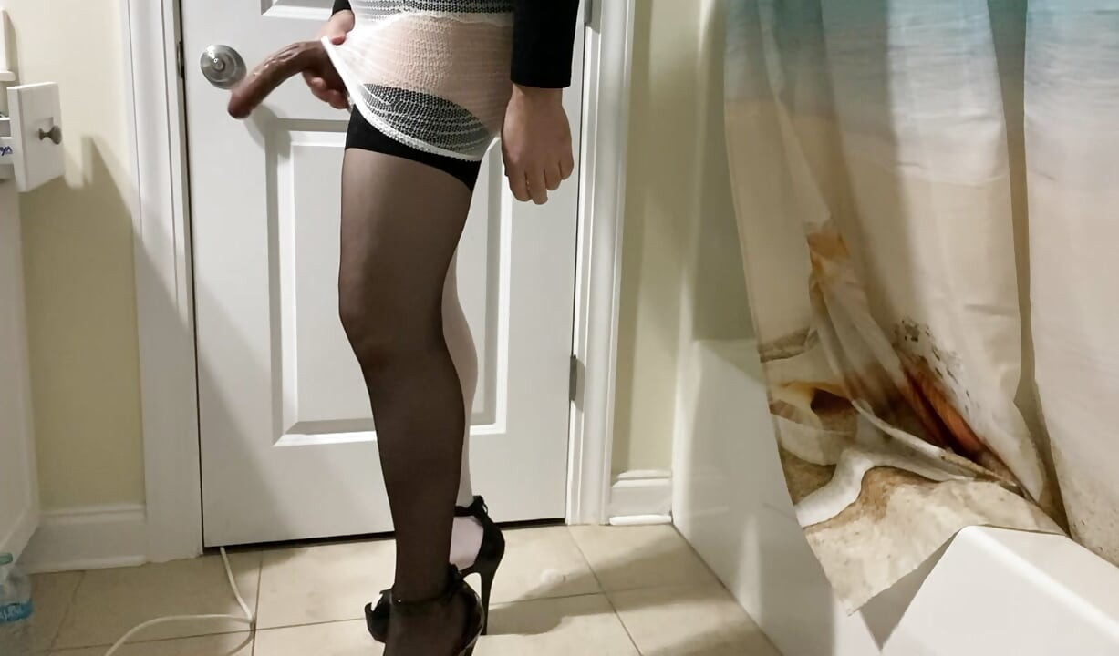 Crossdresser amateur ask if you like black or white stockings the best and gives away panties