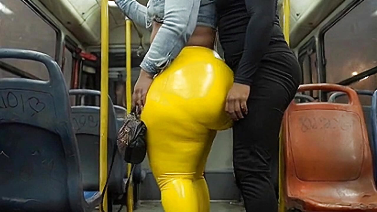 "Masked BBW Teases Huge Ass in Shiny Yellow Leggings on Public Bus"