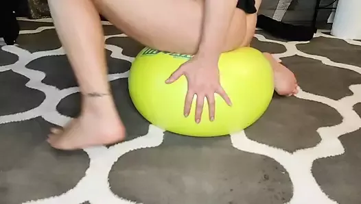 Riding on the exercise ball with double penetration and squirt