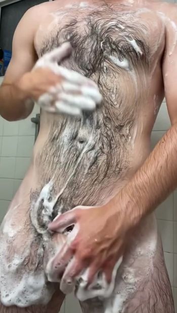 very hairy body soaped up and erecting my cock