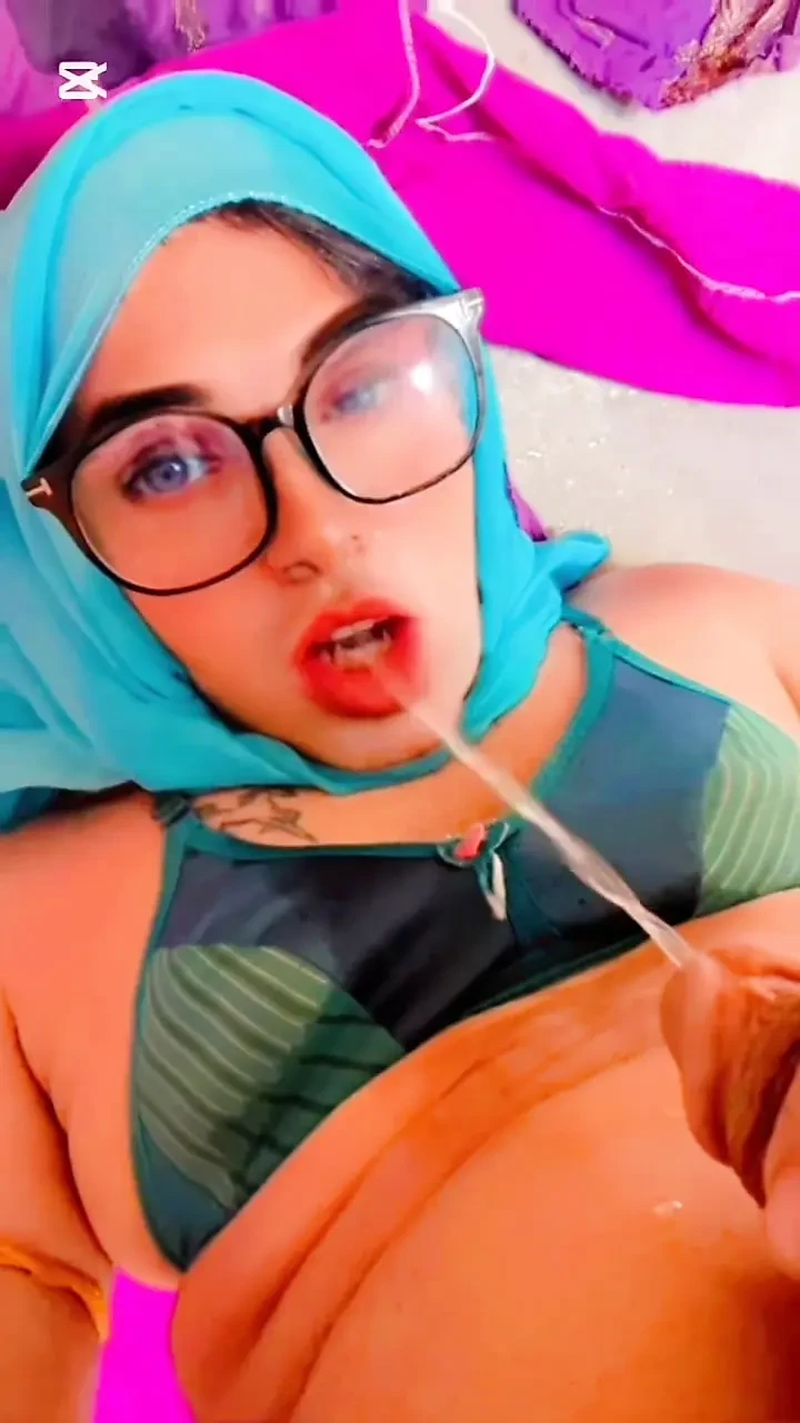 Beautiful Hijabi Transgender Peeing in Mouth