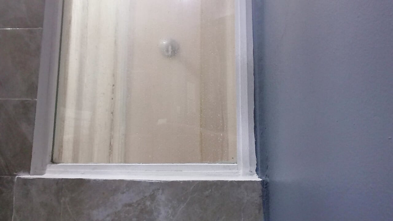 I take a nice bath at the hotel while I wait to relax.