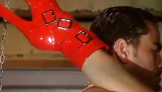 Delivers a steamy blowjob to her slave's cock in a BDSM affair