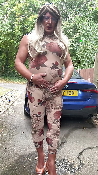 Sexy Crossdresser kellycd2022 in sexy floral see thru catsuit and heels