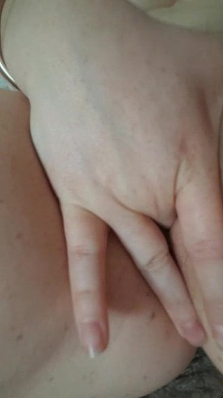 Fingering her wet pussy