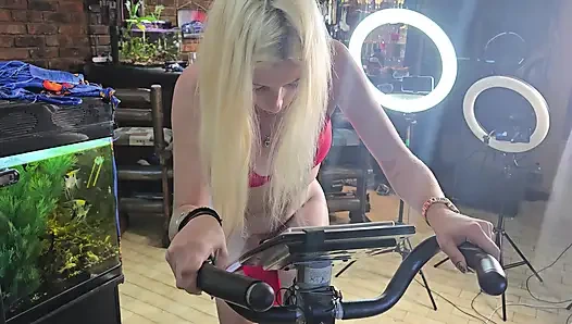 Cute 19 Year Old Blonde Riding Excersize Bike with Massive Dildo