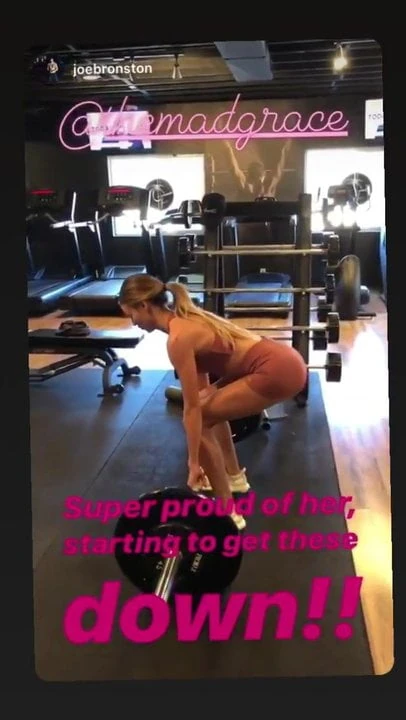 Madison Grace Reed lifting weight