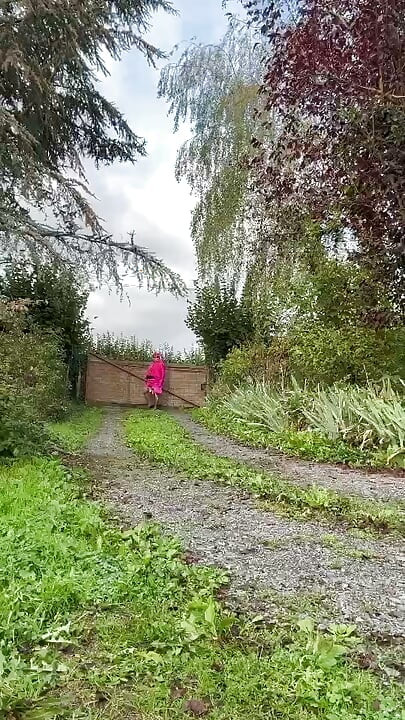 In a fuchsia flight attendant outfit for an evening