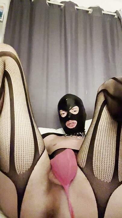 Young sissy crossdresser gently fucks his pussy with dildo
