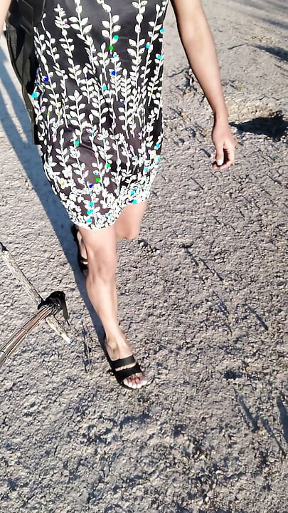 Cute very hot trans slut in dress and sandals goes for a walk to show off her beautiful legs and feet