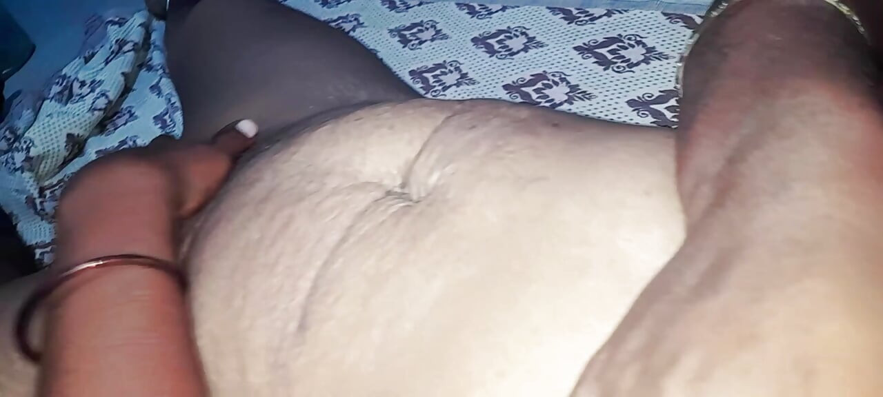 Tamil husband makes his wife who has a big ass bend over and thrusts into her.