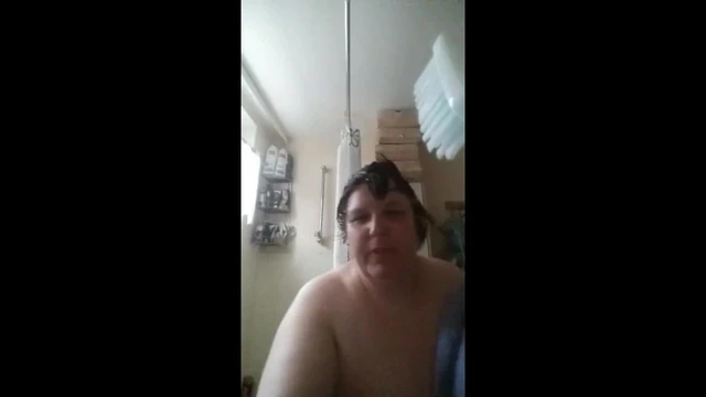 49 year old slut taking a shower.