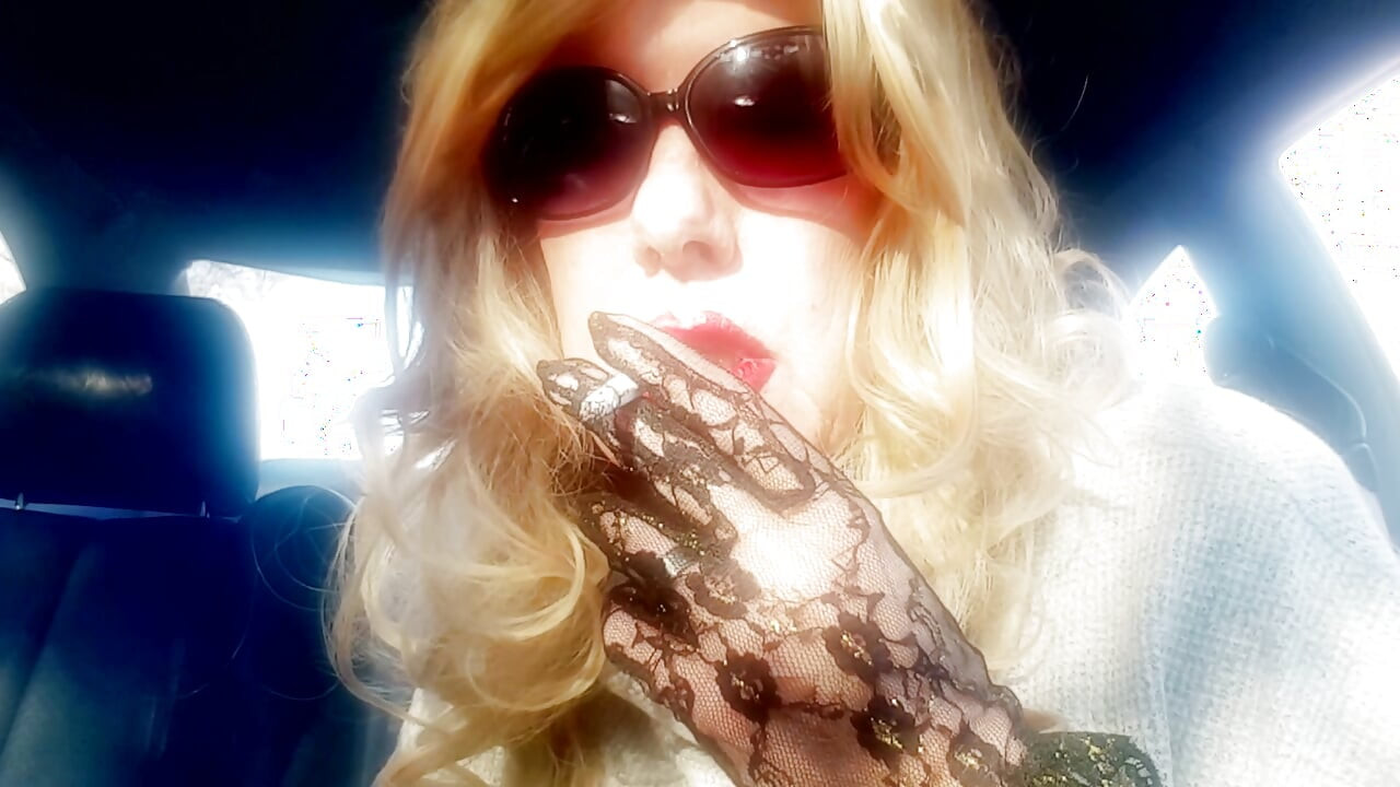 MRS. ROMAN SMOKING MARLBORO 100's IN HER CAR