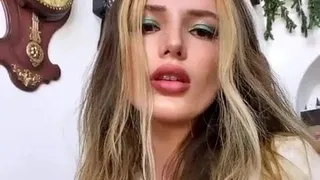 Bella Thorne cleavage and sticking out her tongue, 5-18-2020