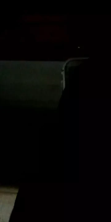 I wore a condom in my bed while naked in black shaded room