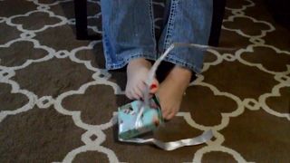 TSM - Lola unwraps a Christmas present with her feet