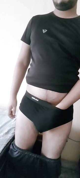 The cock is standing in the underwear.