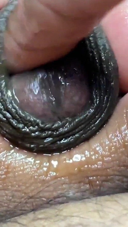 Guy masturbating by rubbing the head of the dick and fingering it like a pussy | Clip 1