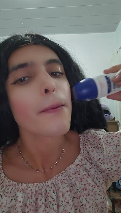 Petite trans girl sucks on deodorant