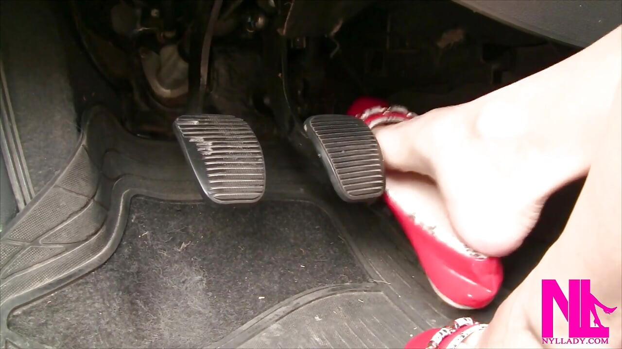 Sexy Barefeet Pedal Pumping in Scarlet Buckled Flats