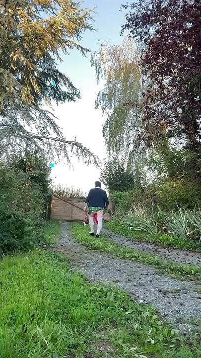 Dressed in a little plaid pleated skirt for a night out