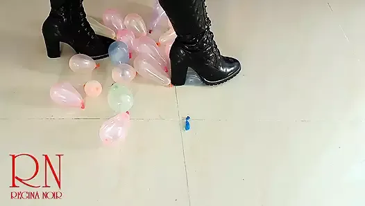 Small balloons pop with high heels boots.