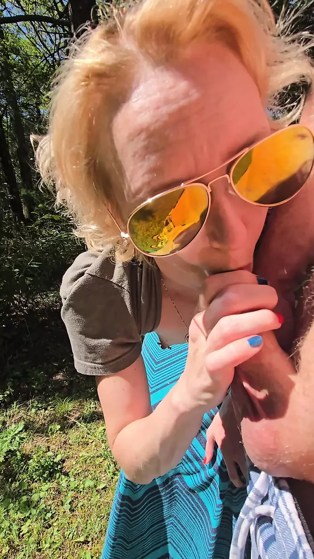 Wife gives quick handjob while walking at the park
