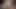 Parlak gümüş taytlı rave kıyafetli ve külotlu çoraplı travesti göğüsleri