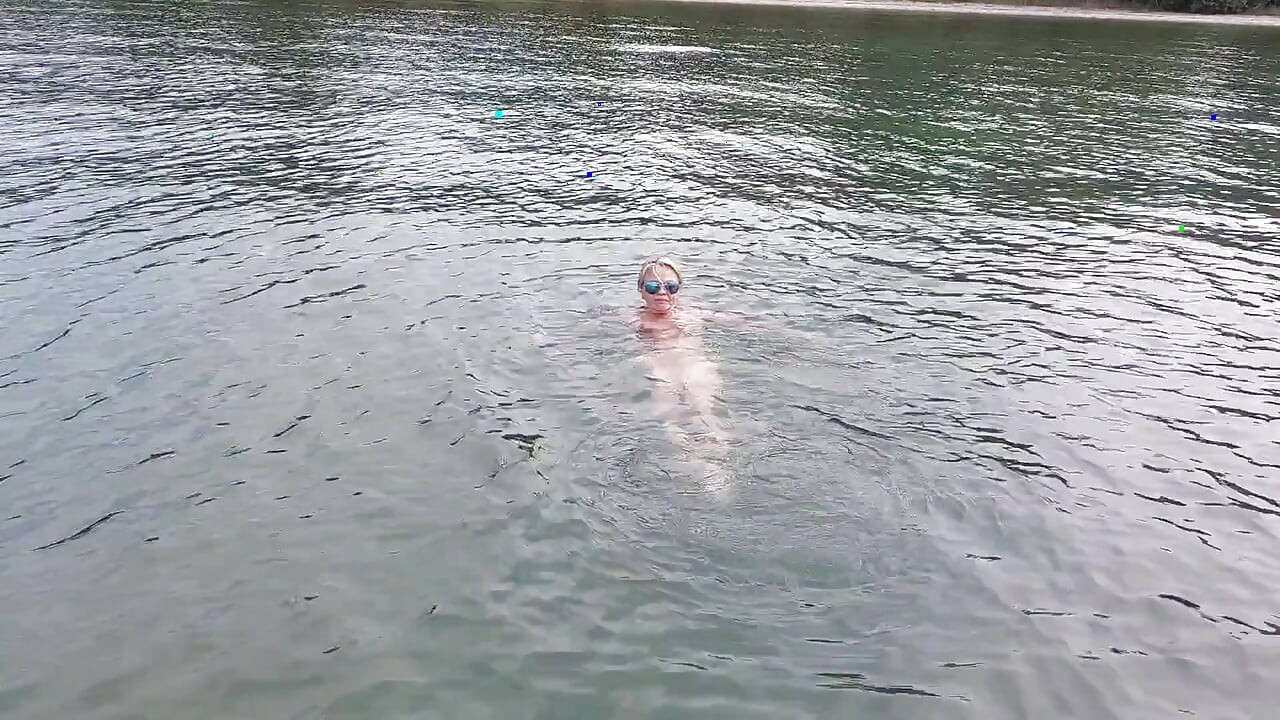 Sexy Granny Swims Naked in a Lake!