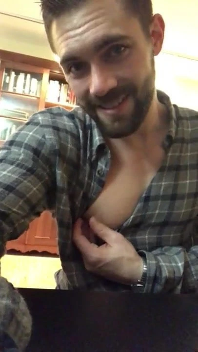 sexy guy playing with his nipple