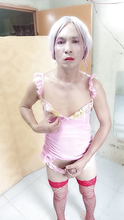 Oanh Le transgender wearing sexy and pornographic clothes standing and screaming is extremely happy