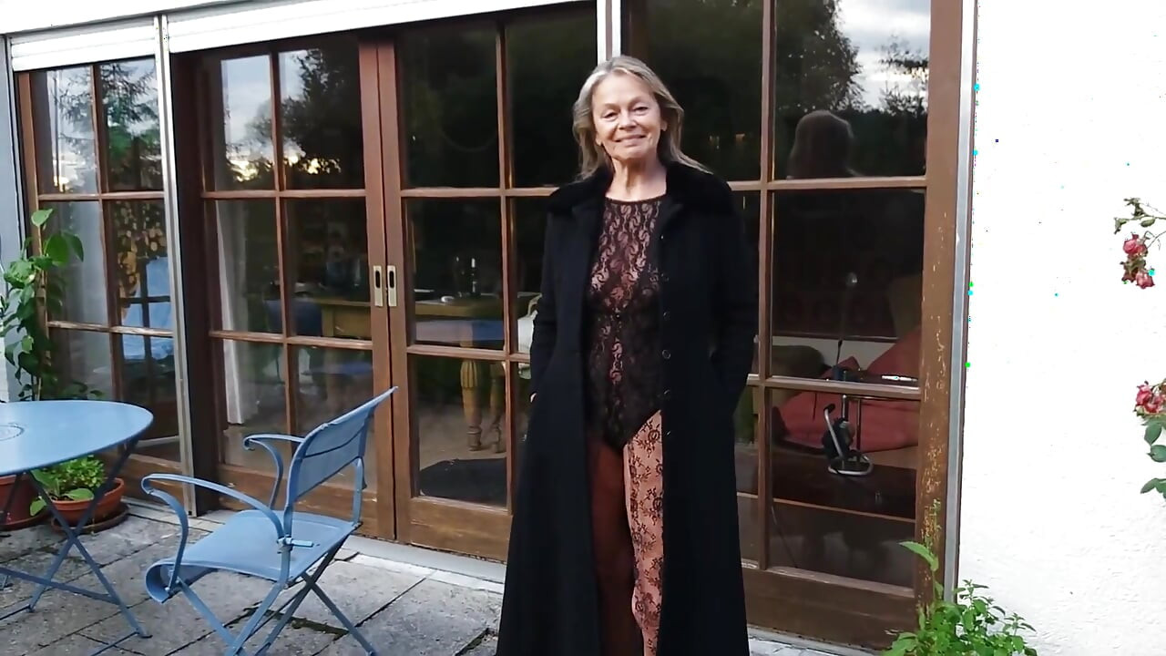 A Mature Woman Shows off Her Figure Outside in a Lace Bodysuit!
