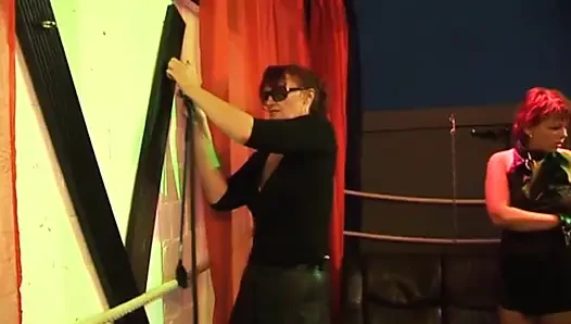 Mature Redhead Squirts Wildly in Intense Group Domination Session
