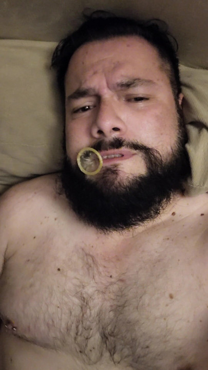 MASTURBATING WITH A CONDOM IN MY MOUTH