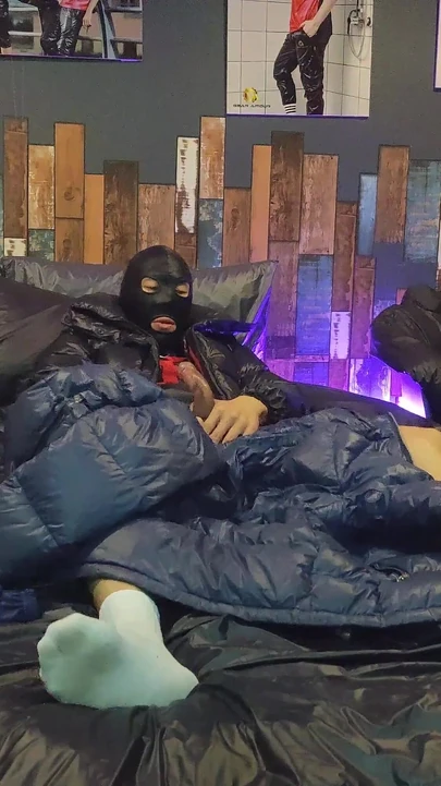 Cock Rubbing Down Jacket on Shiny Nylon Bed
