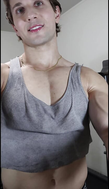 Adonis Beautiful Bodybuilder Boy Poses and Tries to Get You Workout