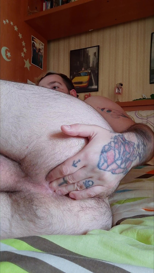 guy plays with his hairy hole.  He is very dilated and loves to put his fingers in