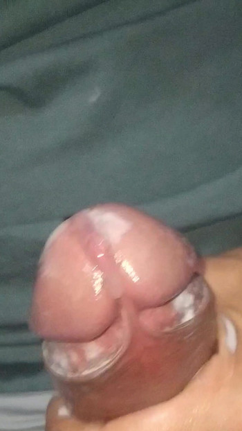 Thrilling moment from "Creamy cock: cum as lubricant for a second cumshot"
