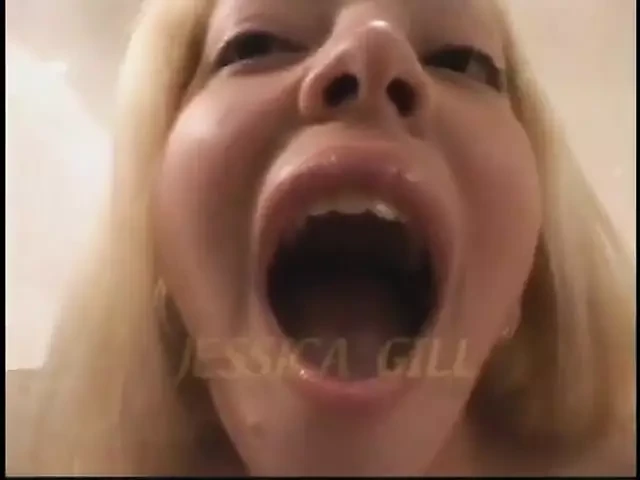 Young blonde opens her mouth wide to get cumload finale