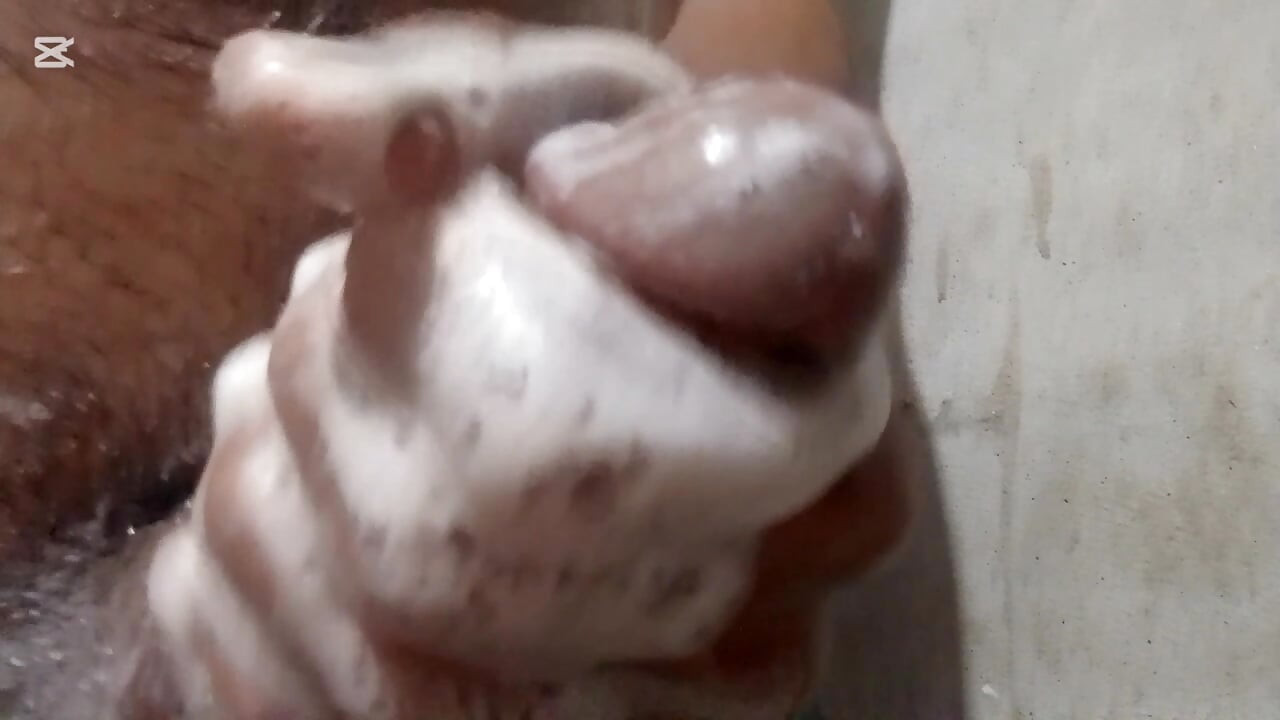 Cute boy enjoying in bathroom and doing handjob