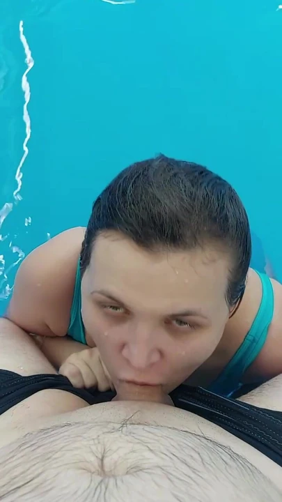 Girl sucking a stranger's dick in a public pool