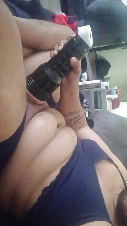 Jerking off with my flashlight dressed in a bra and panties