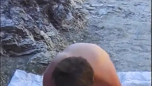Threesome fucking on the beach