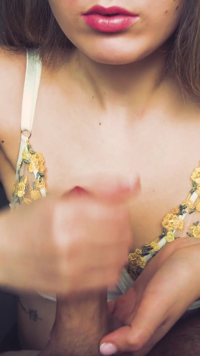 Jaw-dropping moment from "Beauty in beautiful lingerie jerks off her boyfriend. Passionate handjob from a young milf."