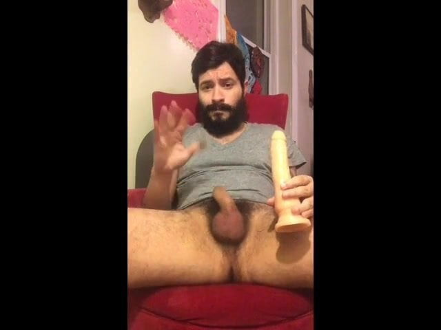 Bearded daddy with a dildo