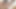 セクシーなブルネットが椅子の上でガラスディルドで膣をからかう