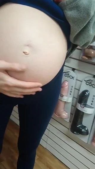 Pregnant Girl at Porno Shop Massive Dildos