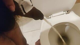 Indian black dick men peeing in the toilet