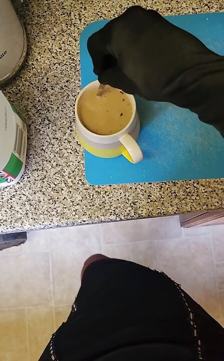 Making a morning cup in hot lingerie